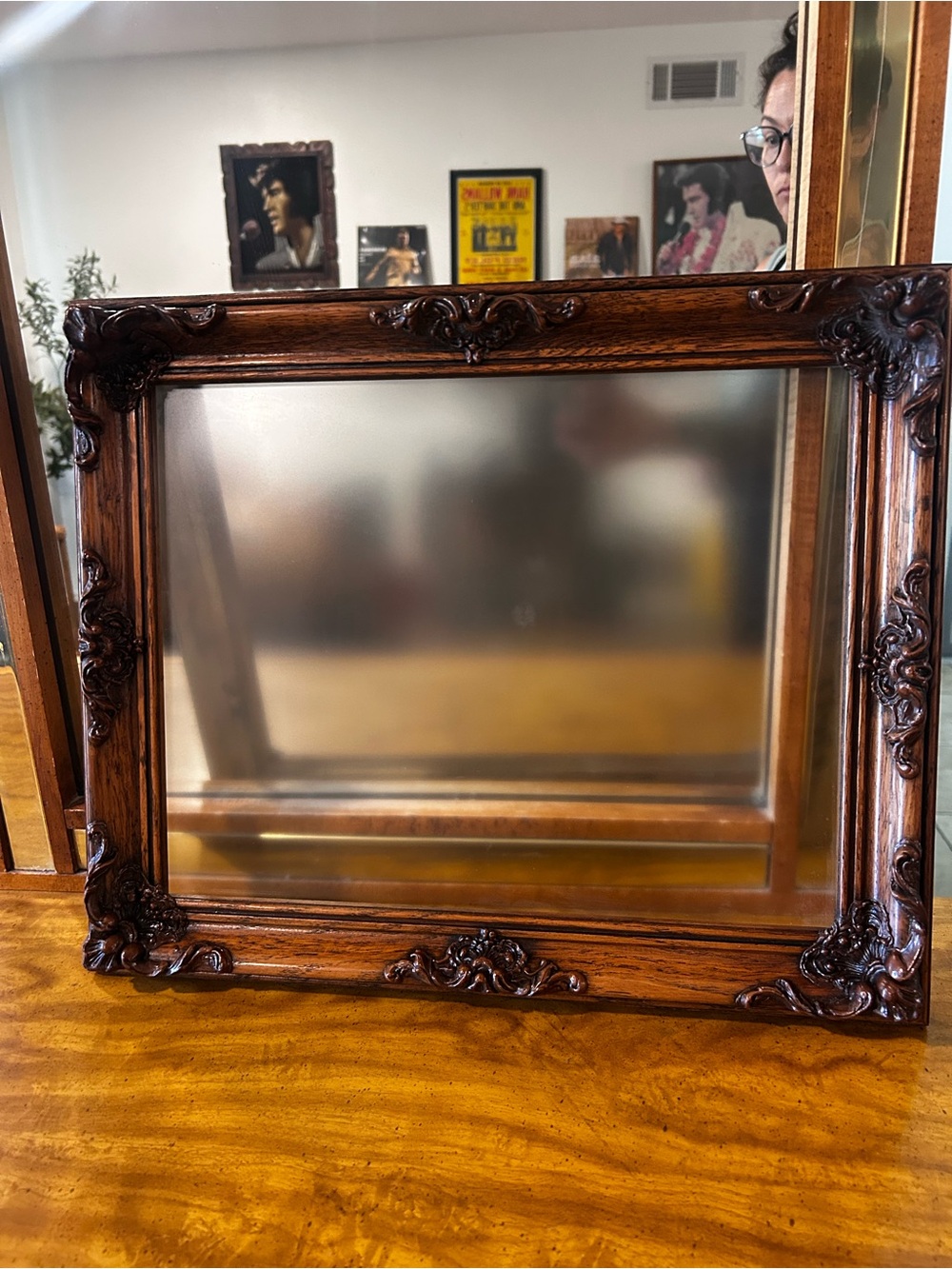 Vintage ornate Victorian-style wood picture frame featuring a rich walnut